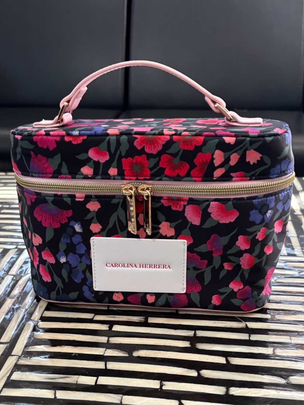 Carolina Herrera Floral Cosmetic Case in Black with Pink and Purple Accents